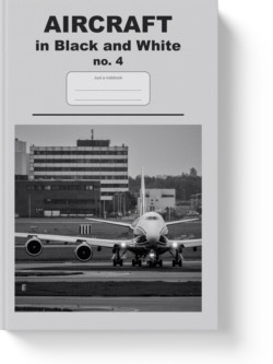 'Aircraft in black and white no. 4' - a notebook or composition journal by Vlavoy. 'Go to Amazon' link.